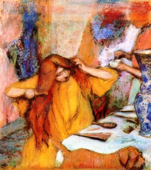 Woman in a Yellow Robe Combing Her Hair