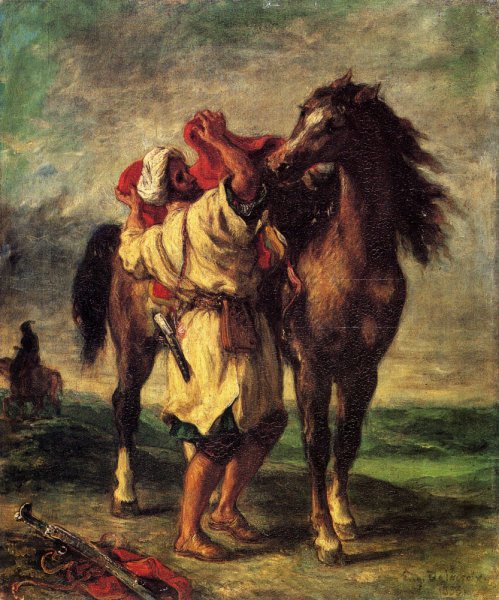 A Moroccan Saddling A Horse