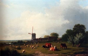A Panoramic Summer Landscape With Cattle Grazing In A Meadow By A Windmill