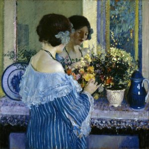 Girl in Blue Arranging Flowers by Frederick Carl Frieseke Oil Painting