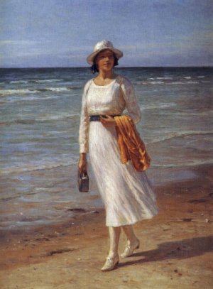 A Lady Walking on a Beach