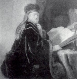Scholar Seated at a Desk by Rembrandt Van Rijn Oil Painting