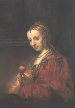 Woman with a Pink Oil painting by Rembrandt Van Rijn