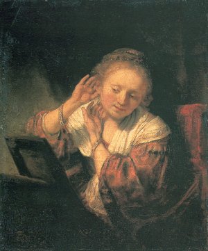 Young Woman at a Mirror by Rembrandt Van Rijn Oil Painting
