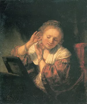 Young Woman at a Mirror by Rembrandt Van Rijn - Oil Painting Reproduction